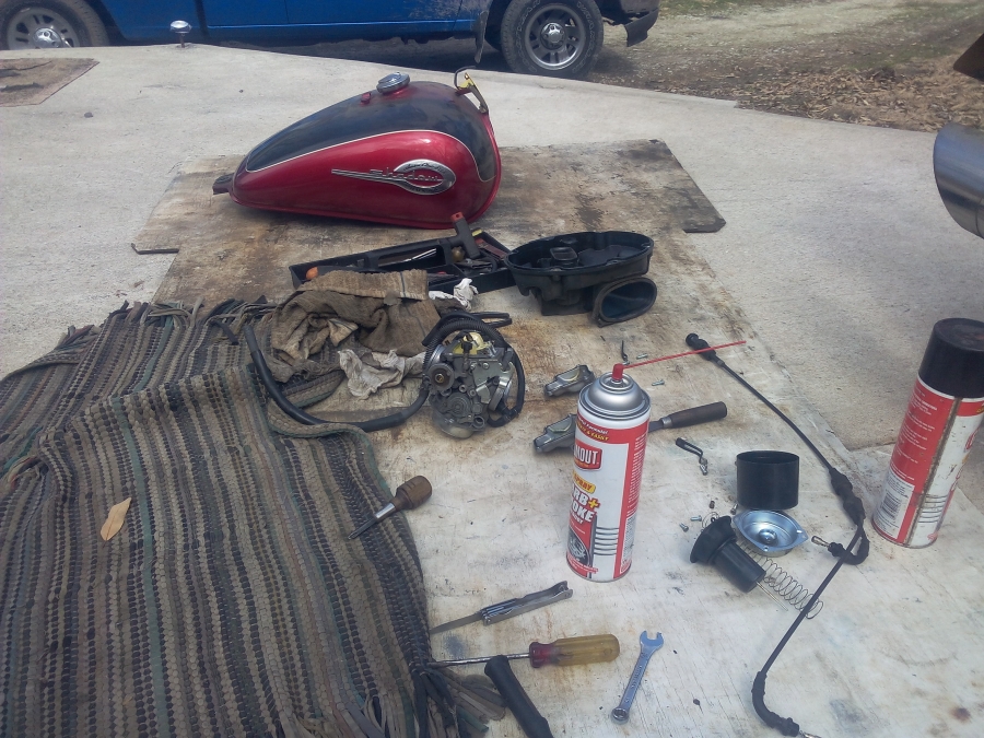 Here is a fuel system in the process of being cleaned up, after the owner decided to ride this 2003 750 Honda Shadow Ace Cruiser again. The motorcycle had been sitting for approximately five years. The customer called PMC Super Tuners out for no start diagnostics, and the technician found the tires low, battery dead, and really bad gas in the fuel tank (smelled like varnish), the carburetors were dirty and clogged with the old fuel. The throttle cables were stuck, the oil, spark plugs, and brakes needed adjusting and changing too.
